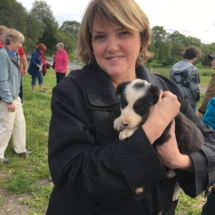NHSCOT Trip to Scotland a picture of a female holding a puppy